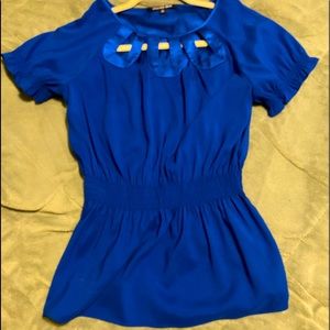 Royal blue Gianni Bini blouse size XS with defined waist and cut-outs at neck
